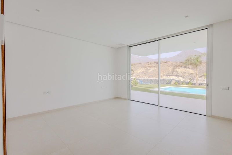 Foto 1f9d6a1b-0d6d-42fd-b8b4-b123a6eec88e. Casa amb aparcament piscina a La Caleta Adeje