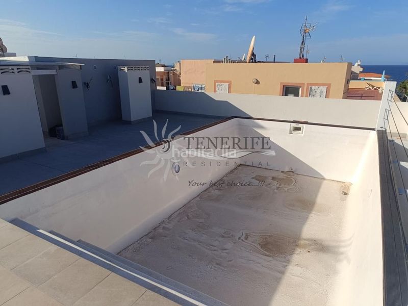 Foto c0f76f7a-7d1d-4bc6-99cc-da080d252c0c. Planta baixa amb aparcament a Playa de San Juan Guía de Isora