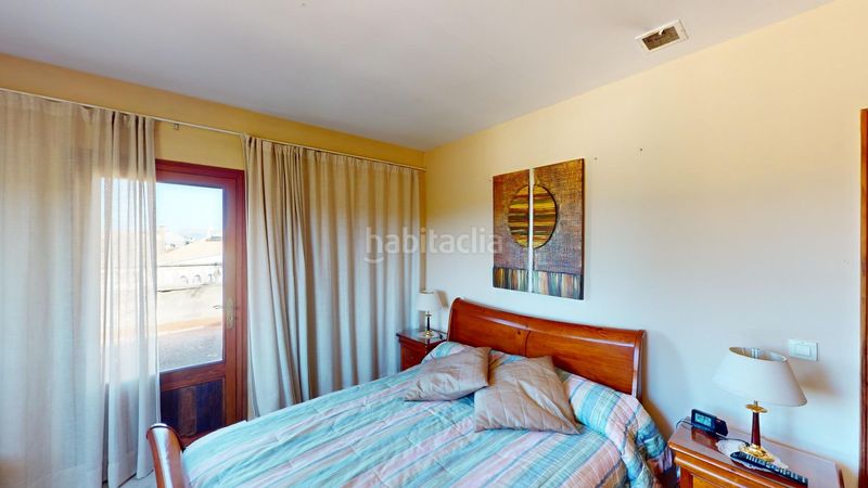 Foto c1b974e9-dcc8-4dc3-9640-7a31fc10f785. Casa  unifamiliar con piscina y vistas al campo en el pueblo en Algaida
