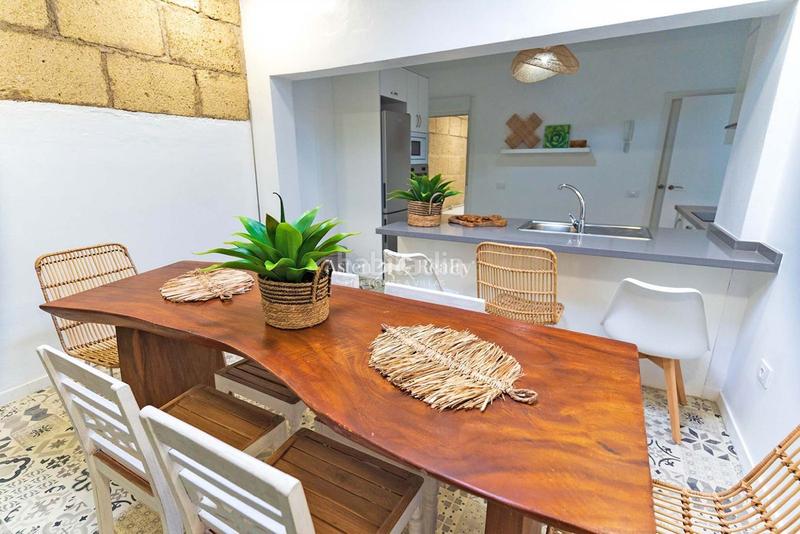 Foto 9d0d920b-f741-45a1-a605-f701297554a6. Casa aparellada amb aparcament piscina a Playa Fañabé Alto Adeje