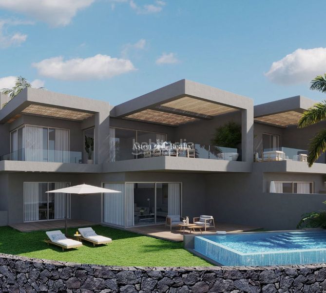 Foto d585bc4e-19de-40cb-9649-058b89a4c58c. Casa adossada amb calefacció aparcament piscina a Adeje