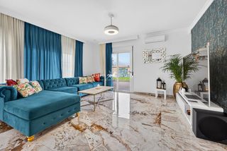 Apartament  Cordón. Vida luminosa con jardín privado y acabados elegantes.