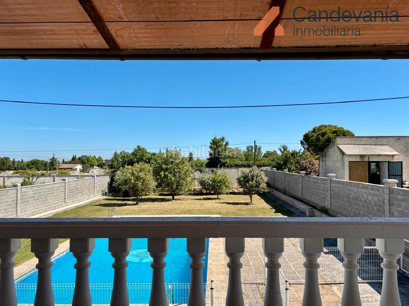 Foto 14286f7c-5d01-4aac-8b28-e4856a74bdca. Chalet with fireplace heating pool in San Mateo de Gállego