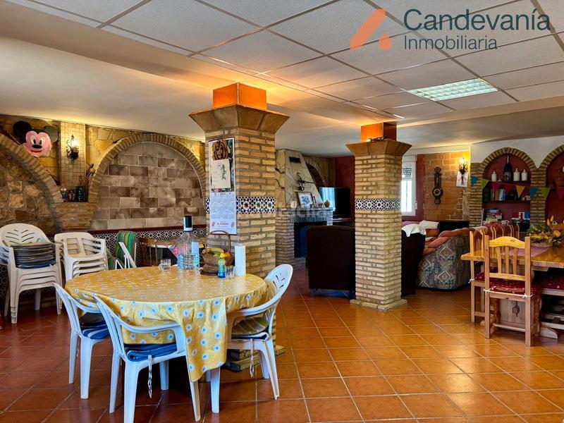 Foto b38c6262-b485-4683-84be-0345fcf25803. Chalet with fireplace heating pool in San Mateo de Gállego