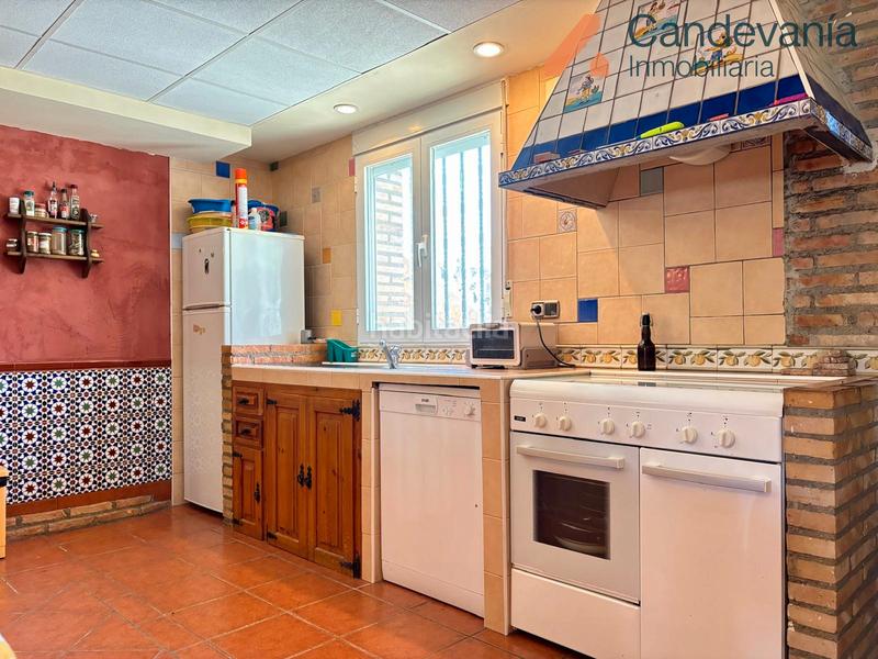 Foto cadccb0d-a6eb-453b-b406-5c5aa5f8872c. Chalet with fireplace heating pool in San Mateo de Gállego