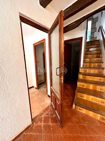 Foto 46ff13c0-dc9f-4402-aac3-61b6d00cef48. Masía casa de piedra para restaurar con garaje y patio en pleno centro del pueblo en Calonge