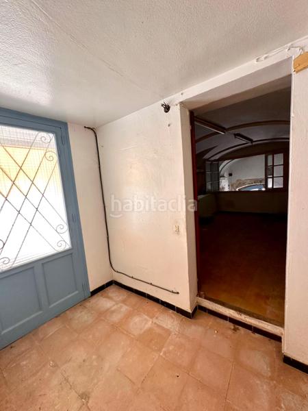 Foto 5703c1ef-0657-40e3-8e4a-8d3279e6a5fe. Masía casa de piedra para restaurar con garaje y patio en pleno centro del pueblo en Calonge