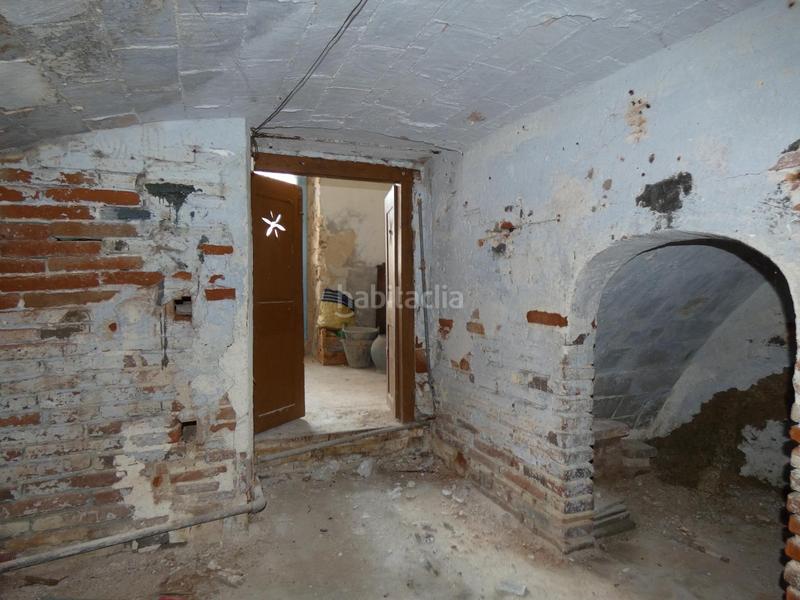 Foto ad3a96f8-2d1c-4a95-a7bd-f933c96f7d81. Masía casa de piedra para restaurar con garaje y patio en pleno centro del pueblo en Calonge