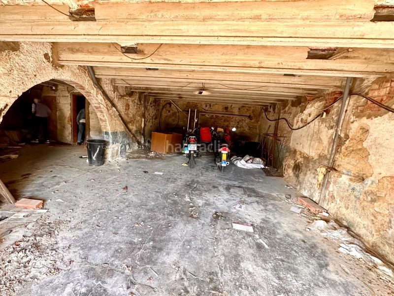 Foto d9642d44-68ee-4390-b446-6067428d768e. Masía casa de piedra para restaurar con garaje y patio en pleno centro del pueblo en Calonge