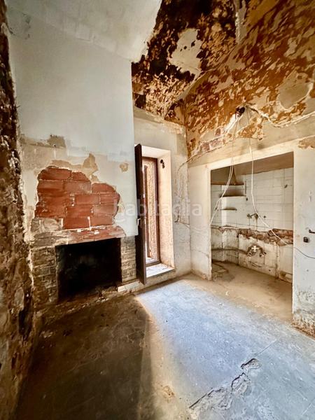 Foto daa0160e-b9fe-4038-8f84-80b50c2d6504. Masía casa de piedra para restaurar con garaje y patio en pleno centro del pueblo en Calonge