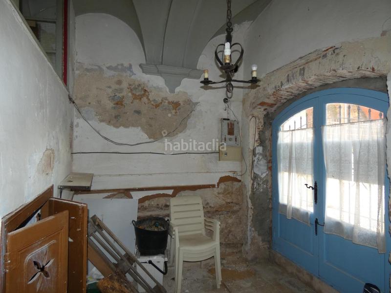 Foto e1f67481-66db-466c-bbfe-f5d3940f4ddb. Masía casa de piedra para restaurar con garaje y patio en pleno centro del pueblo en Calonge