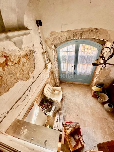 Foto eacb4a4f-8224-4a2d-a145-9ba37a4b0908. Masía casa de piedra para restaurar con garaje y patio en pleno centro del pueblo en Calonge