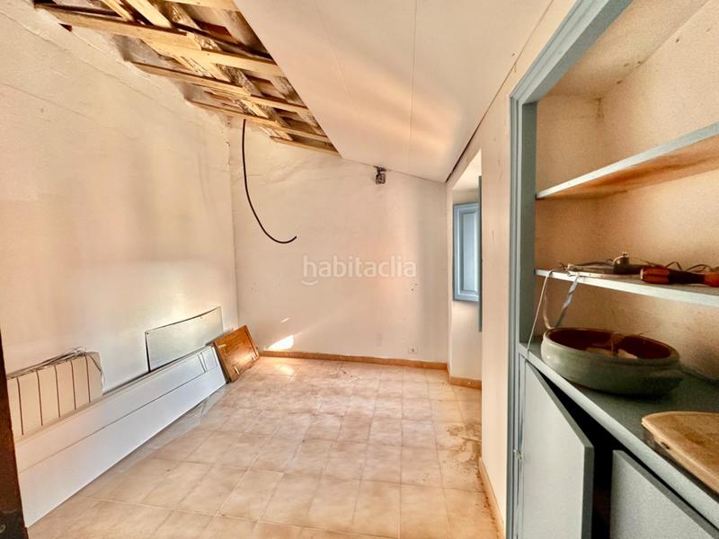 Foto effffd8f-cfd5-4ea2-a7ff-a322482c53a8. Masía casa de piedra para restaurar con garaje y patio en pleno centro del pueblo en Calonge