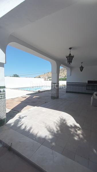 Foto 6cd65f52-e00f-4f0c-8db2-efbc862c7e2a. Chalet con camino riscaldamento parcheggio piscina in Loja