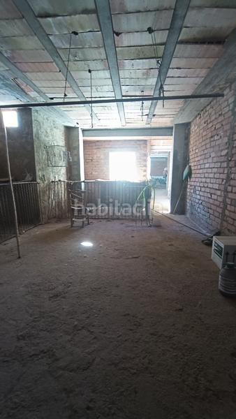 Foto b489deab-afe6-4568-a97d-333a54487da1. Haus mit kamin parking in Loja