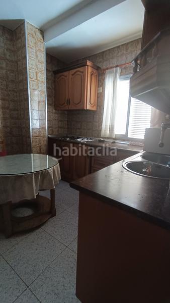 Foto c32a73ef-8cab-409b-990d-40cbd0ef2d5e. Haus mit kamin parking in Loja