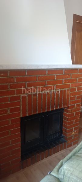 Foto 48601d27-3eaf-4af3-b6a7-cea2866d0d7f. Appartement avec cheminée dans Loja