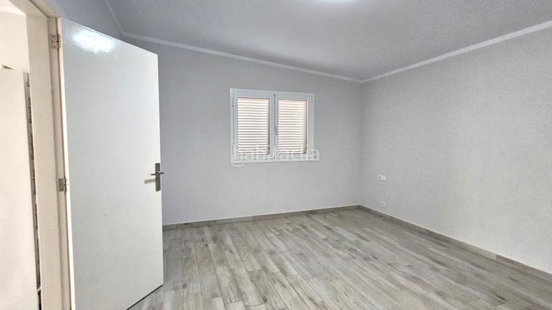 Foto 205ac868-6a9c-4be9-a02a-f24620429434. Casa aparellada a paseo violeta 3° 30 a Palm - Mar Arona