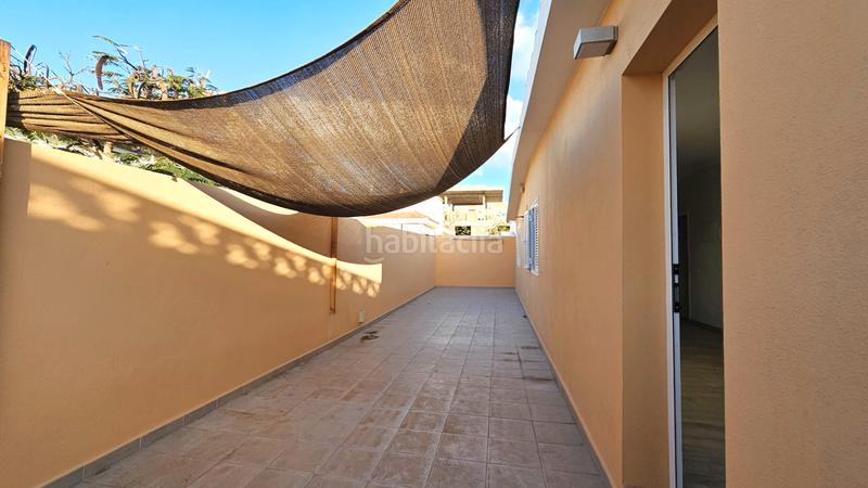 Foto d61f9c51-c858-4cc5-b61f-d6e6604a97a6. Casa aparellada a paseo violeta 3° 30 a Palm - Mar Arona