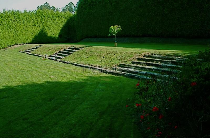 Foto 092fc43a-c9f1-46c5-a927-bf9b45412551. Chalet avec cheminée chauffage parking dans O Milladoiro Ames