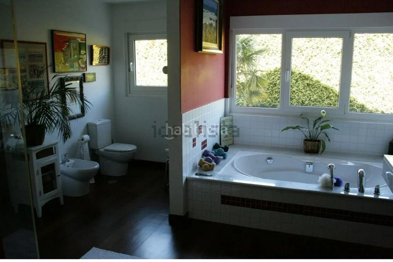 Foto 185053b5-8584-40d5-9908-e962ac64045a. Chalet avec cheminée chauffage parking dans O Milladoiro Ames