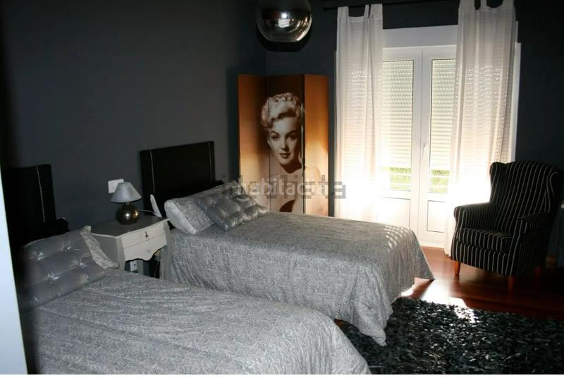 Foto 6c06a806-8611-4ee9-9a14-a6abc343c64d. Chalet avec cheminée chauffage parking dans O Milladoiro Ames