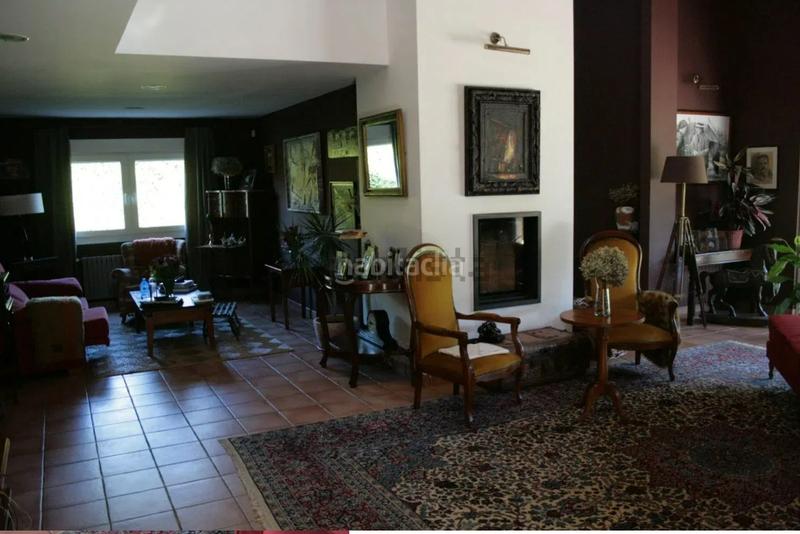 Foto 7ef3018a-797a-4998-a435-e9439987a8aa. Chalet avec cheminée chauffage parking dans O Milladoiro Ames