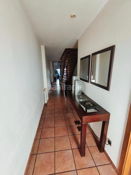 Foto 289fea09-00a6-447f-8ee5-5a7821306a41. Casa a schiera con camino riscaldamento parcheggio in Oleiros