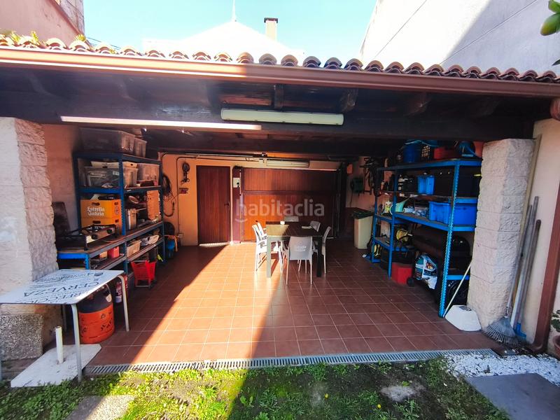 Foto f71d6b28-a6b7-4496-9de3-3cc0919996e1. Casa a schiera con camino riscaldamento parcheggio in Oleiros