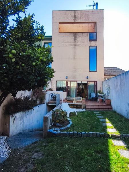 Foto f795df17-f8e0-4f34-b112-cb7d3ea51f8c. Casa a schiera con camino riscaldamento parcheggio in Oleiros