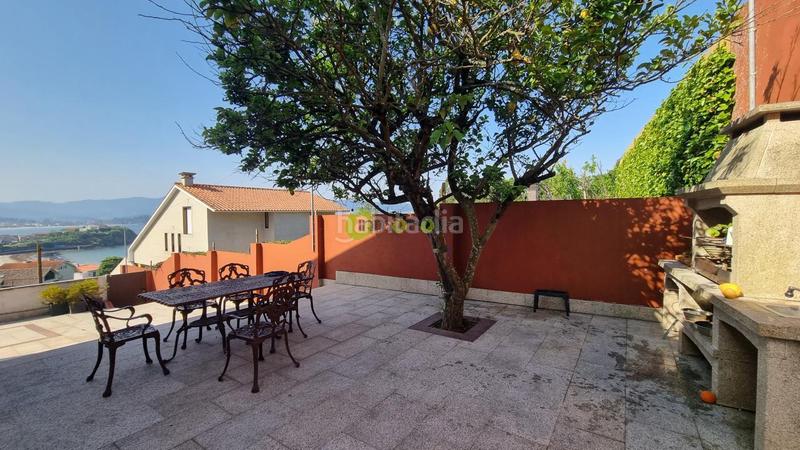 Foto d2af9785-df7c-437d-8cd1-761db742d262. Chalet with heating parking in Panxón Nigrán