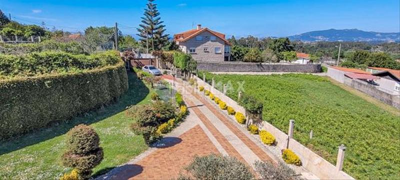 Foto ea77333d-20e7-4b9d-bdf5-d924f6c90114. Chalet a tan solo 3km del mar ..chalet en piedra con amplia piscina en Baiona