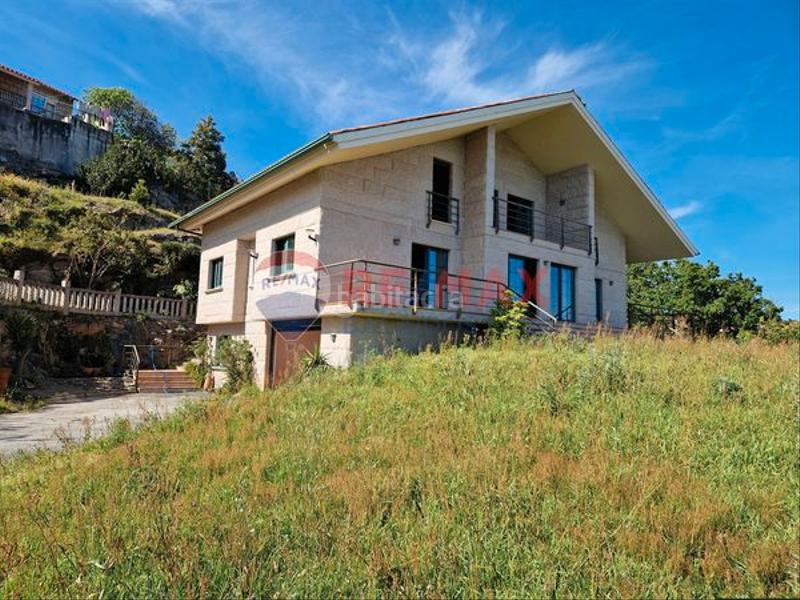 Foto 0fd267b5-0e44-4a59-9571-e2f3d899e4f3. Chalet exclusivo chalet con vistas al mar en Moaña
