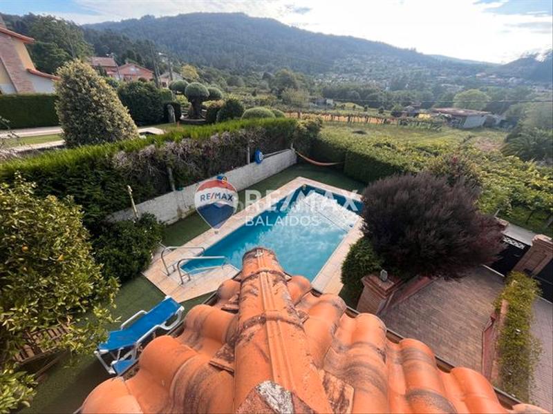 Foto a9858c48-2479-49cc-bbba-266bb5532c37. Casa amb xemeneia calefacció aparcament piscina a Gondomar