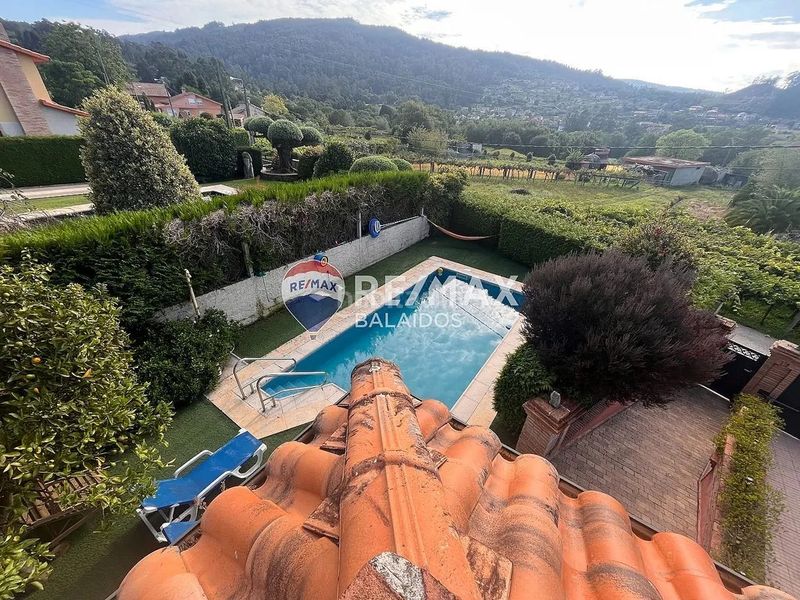 Foto 490d1850-640f-4858-a5d7-b2c098ea93bd. Casa amb xemeneia calefacció aparcament piscina a Gondomar