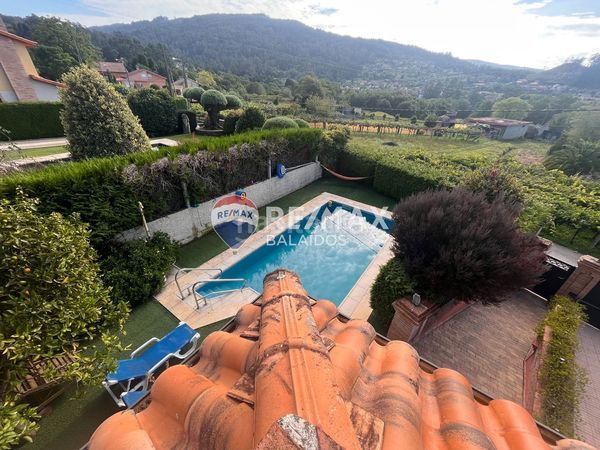 Foto db8d3cb2-620f-41a6-bda2-031b4f52d623. Casa amb xemeneia calefacció aparcament piscina a Gondomar