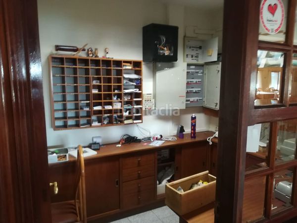 Foto e14c396a-8b9c-42cc-9d47-eacd097f3bcf. Edifici a Guarda (A)