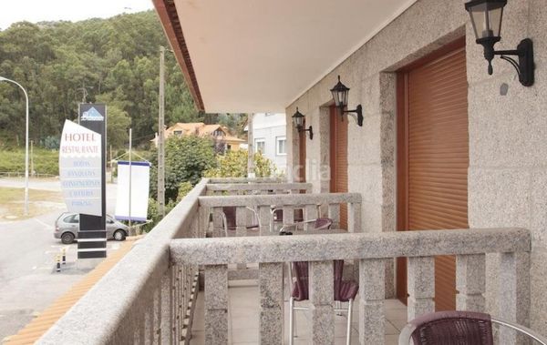 Foto f7e13aa4-0a9f-43e0-a79b-6c2db34604a8. Edifici a Guarda (A)