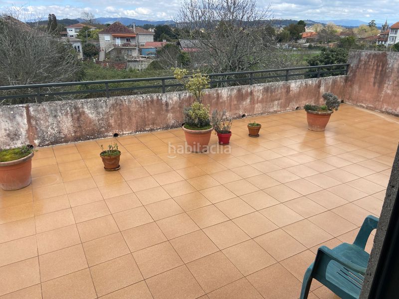 Foto 1318d7f9-ce1a-47e9-b205-870a896f136e. Casa adossada amb calefacció aparcament a Tui
