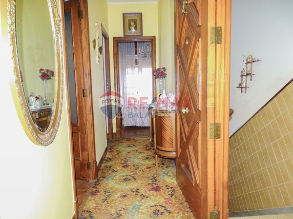 Foto 98d4c701-74e5-400d-a423-d3f2ac856383. Casa adossada a Lavadores Vigo
