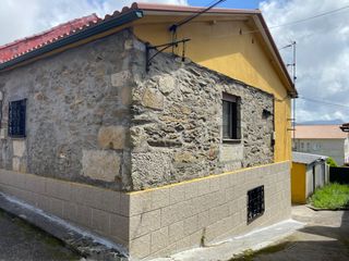 Casa adossada a Rúa Milladas
