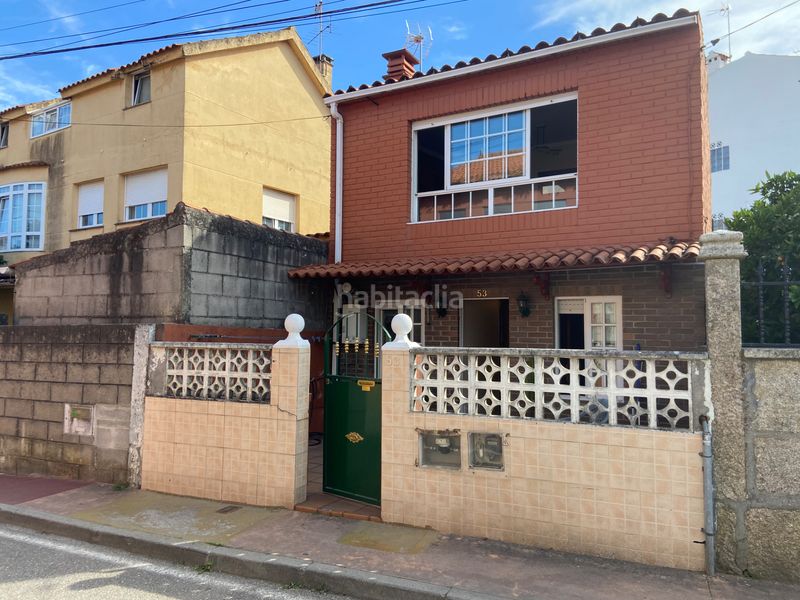 Foto bf8f89b3-a725-4453-89f9-3f72b4b4fd6c. Casa adossada a Teis Vigo