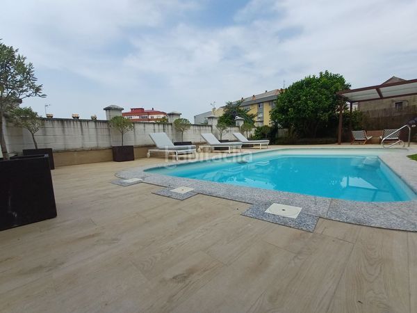 Foto 555c2080-0a4f-4c86-86e1-30b5e26d6c2d. Casa amb calefacció aparcament piscina a Teis Vigo