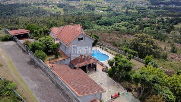 Foto e4fa0bfa-e5b7-4bb6-b9ea-fbffb10fc365. Chalet en Neves (As)