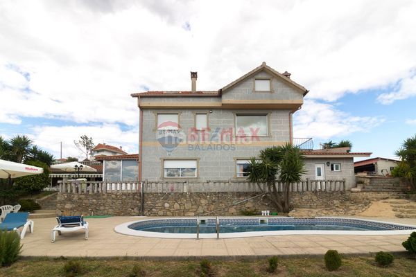 Foto ff76bb0b-f45a-466f-a842-c4e1552e4246. Chalet en Neves (As)