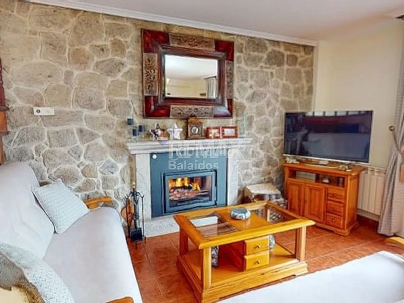 Foto fd99b12b-77f1-4635-816d-7ef5274a66a0. Casa amb xemeneia calefacció aparcament a Ponteareas
