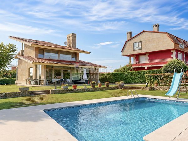 Foto b2339c62-b121-4a9a-9465-1ec69b65dea3. Casa amb calefacció aparcament piscina a Coruxo - Oia - Saiáns Vigo