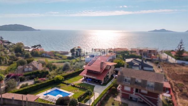 Foto bf536108-1773-43b9-b3ae-a2301a97e61b. Casa amb calefacció aparcament piscina a Coruxo - Oia - Saiáns Vigo