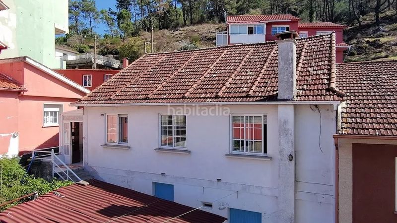 Foto 9754f467-ba2c-428f-a9d3-b461b38103b2. Casa amb calefacció aparcament a Aldán Cangas