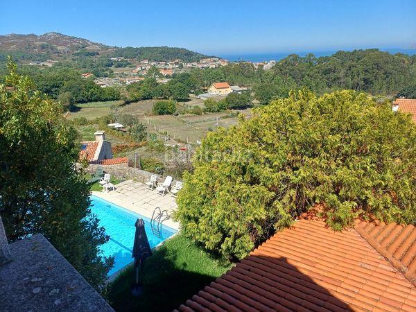 Foto b2d5fe90-52c2-41f6-998a-e85b4121737f. Casa amb calefacció aparcament piscina a Baiona